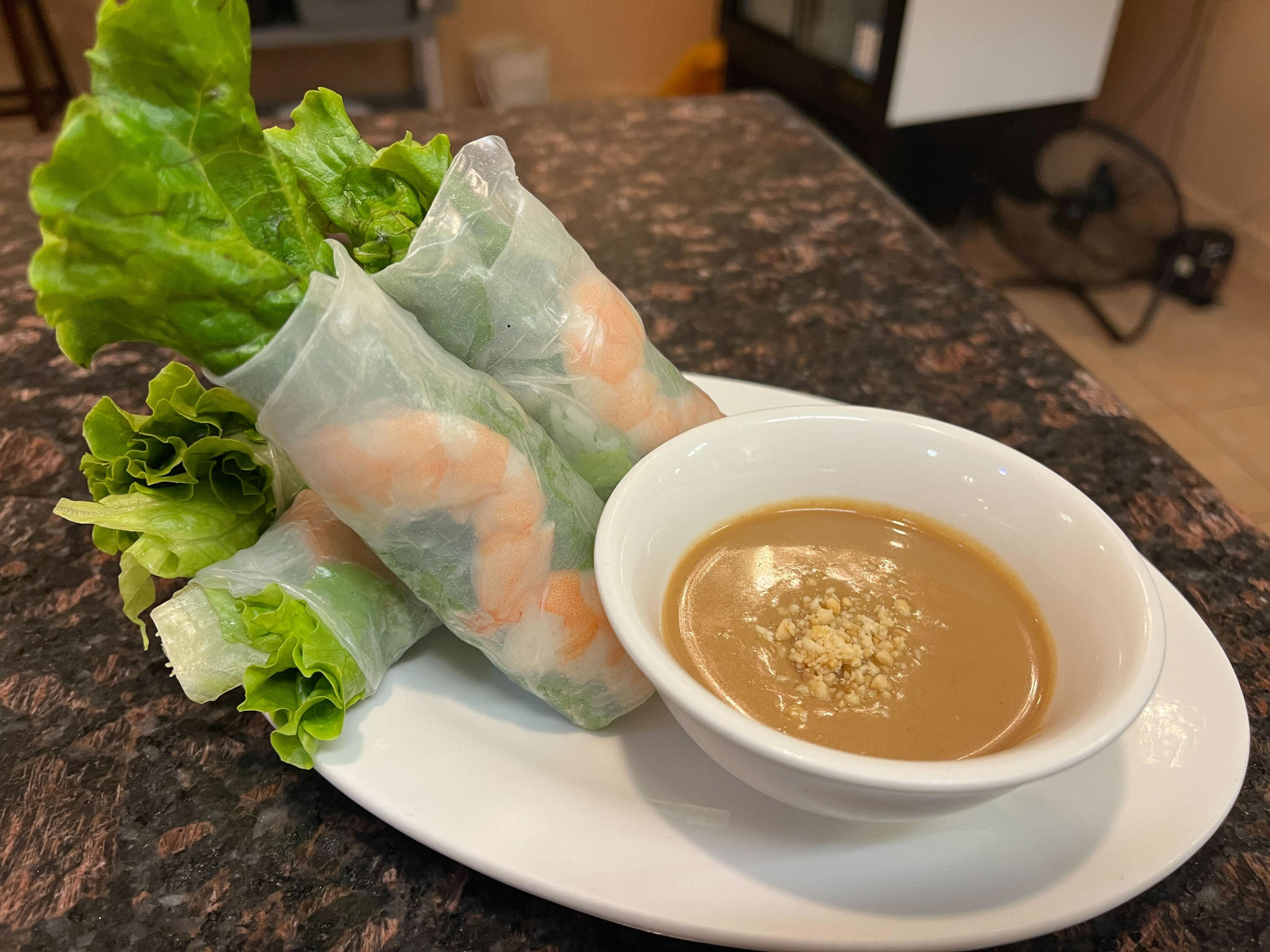 Shrimp fresh spring rolls served with a creamy peanut dipping sauce