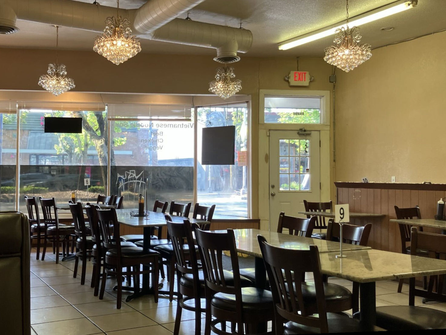 Interior of Pho An Restaurant with sunlight coming through the front windows